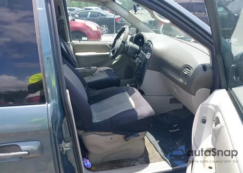 2005 Dodge Grand Caravan Sxt z USA, uszkodzony, nr VIN 2D4GP44L95R242873